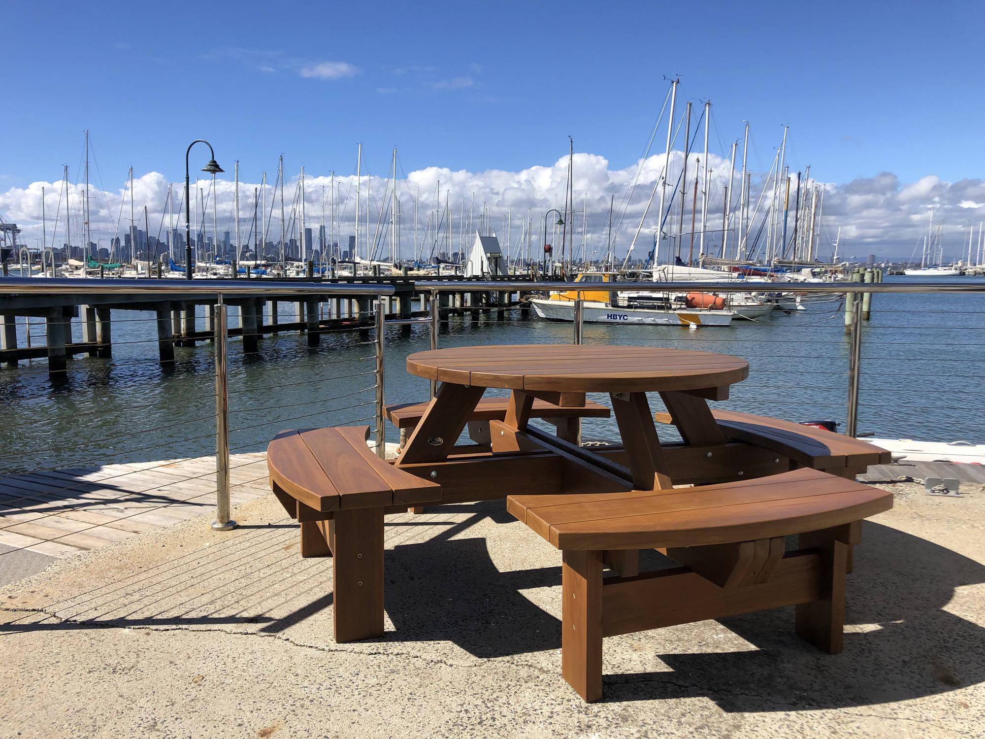 Handcrafted Australian hardwood outdoor furniture in a garden setting